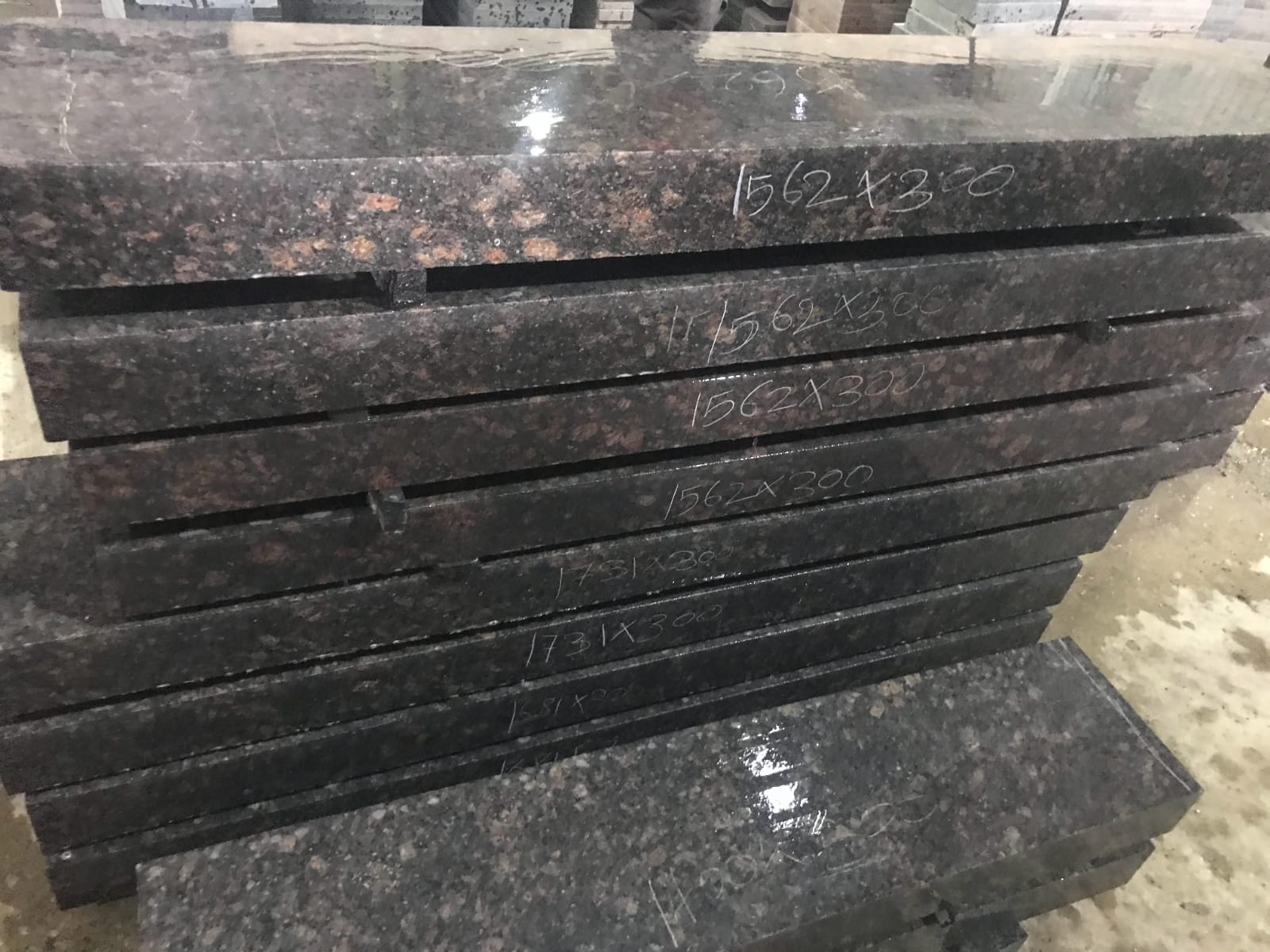 Polished tan brown granite steps and treads fabricated to specified sizes